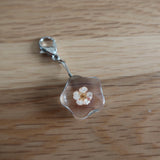 Yellow/orange dried Flower in resin progress keeper