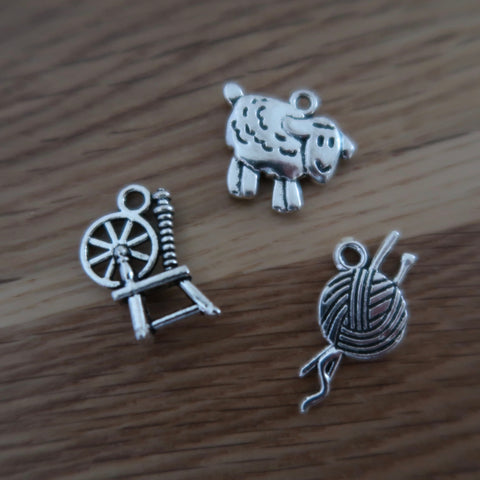 Wool themed stitch markers or progress keepers Spinning wheel, sheep and yarn / needles (set if 3)