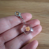 Yellow/orange dried Flower in resin progress keeper