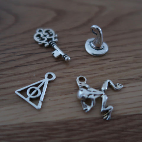 Wizard inspired stitch markers or progress keepers (set of 4) frog / wizard hat / key / symbol