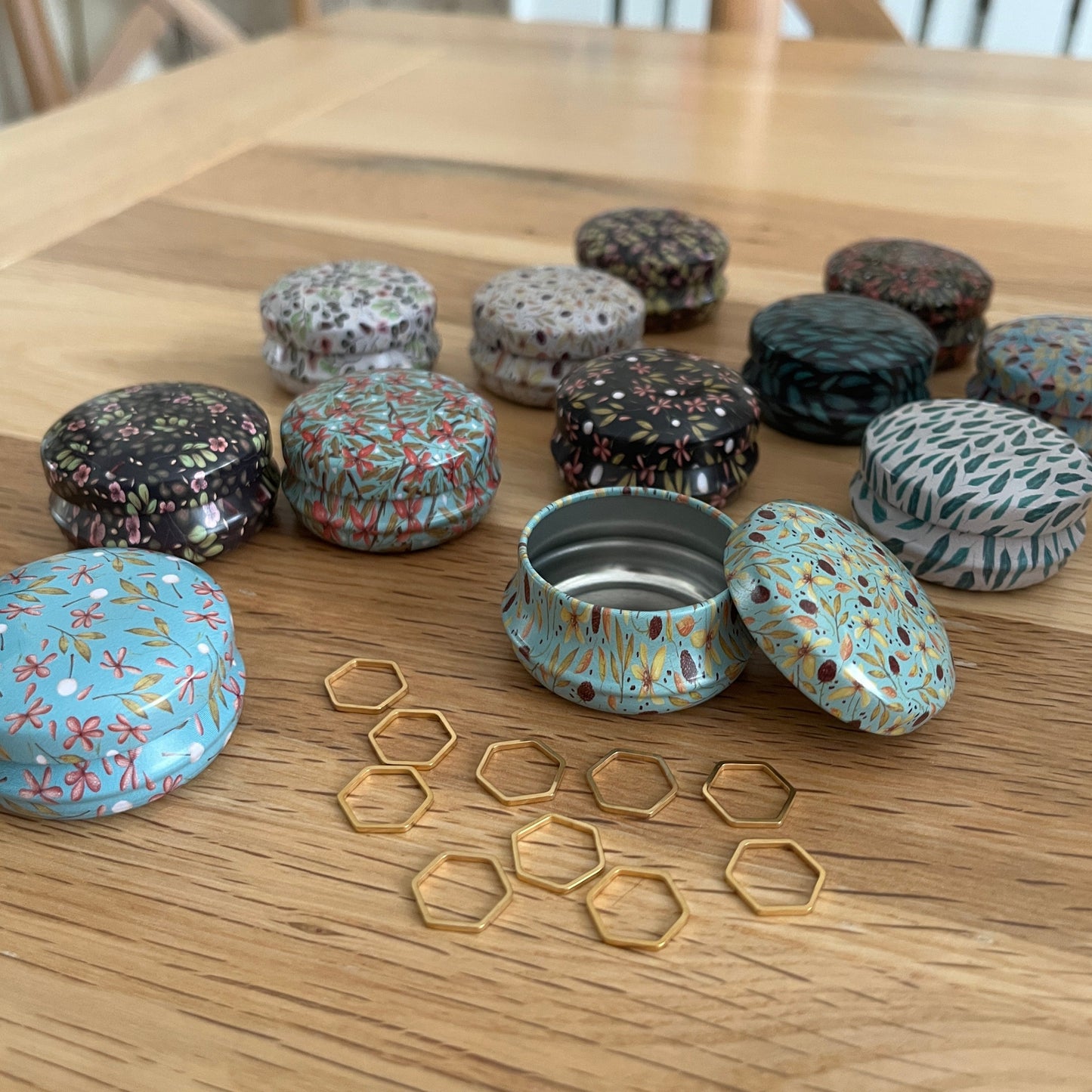 Floral Tin with hexagon stitch markers