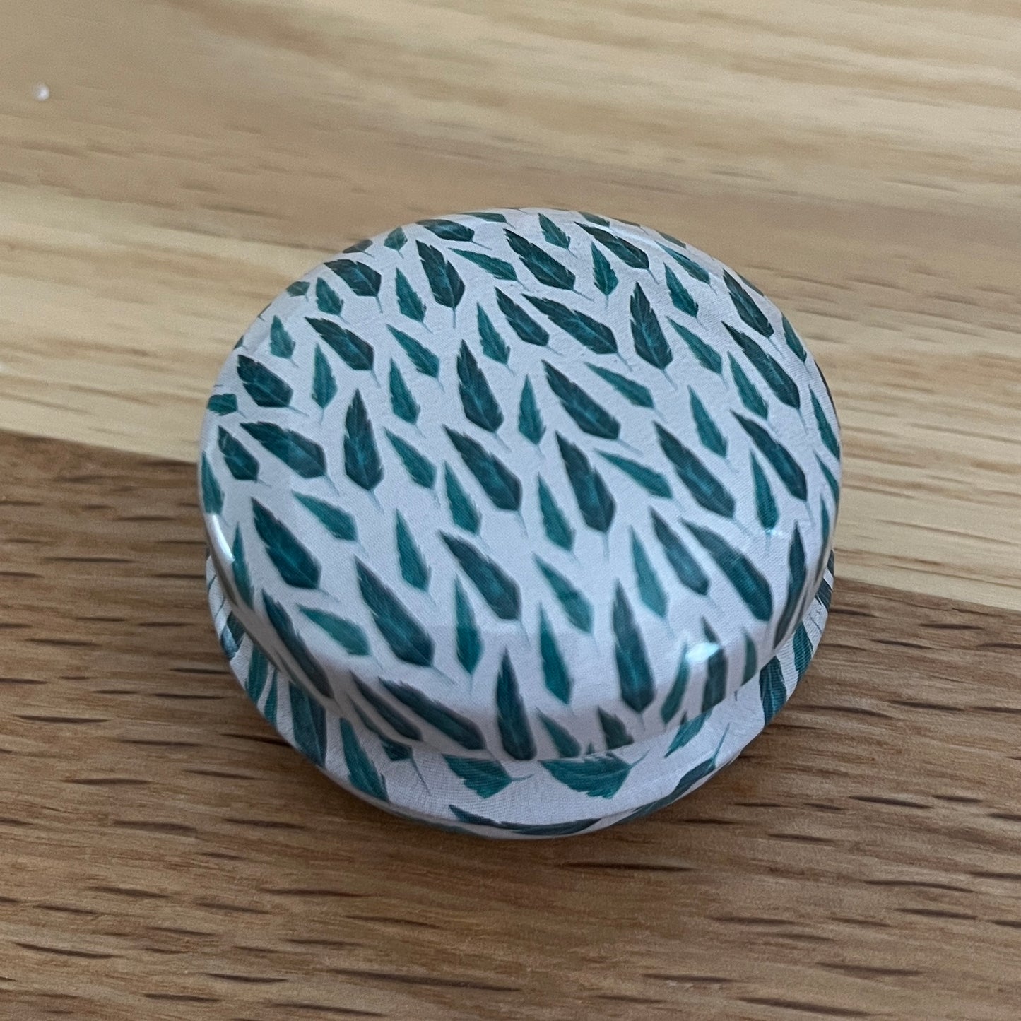 Floral Tin with hexagon stitch markers