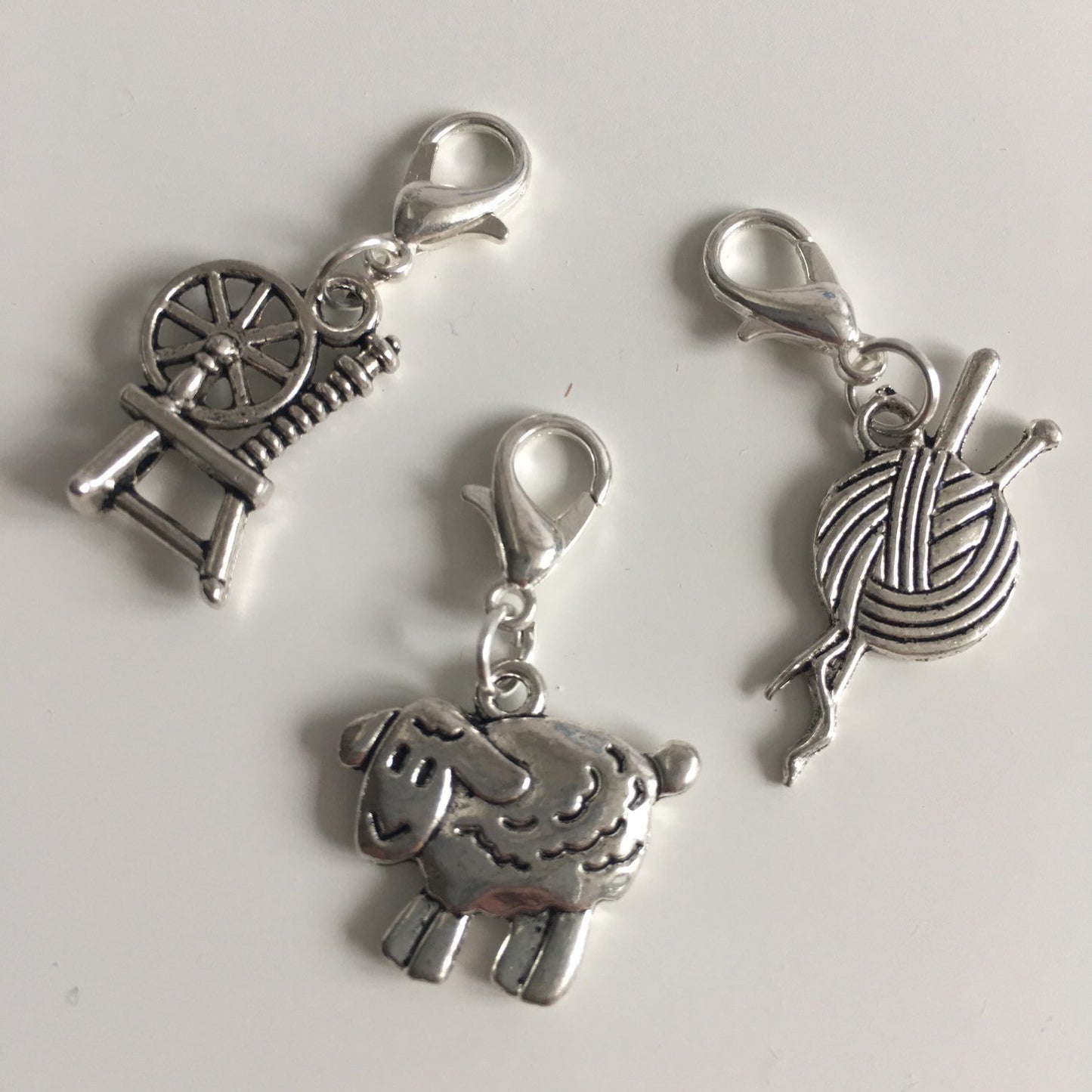 Wool themed stitch markers or progress keepers Spinning wheel, sheep and yarn / needles (set if 3)
