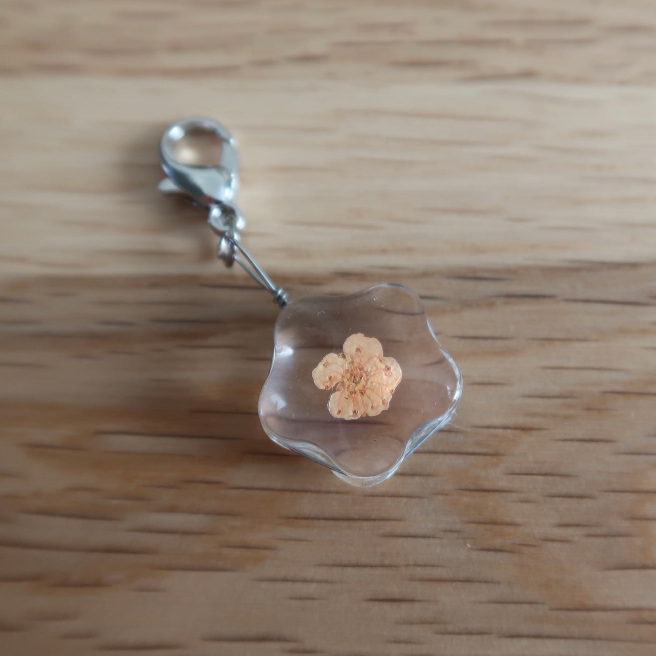Yellow/orange dried Flower in resin progress keeper