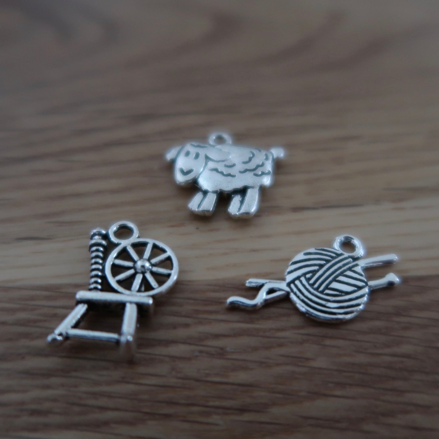 Wool themed stitch markers or progress keepers Spinning wheel, sheep and yarn / needles (set if 3)