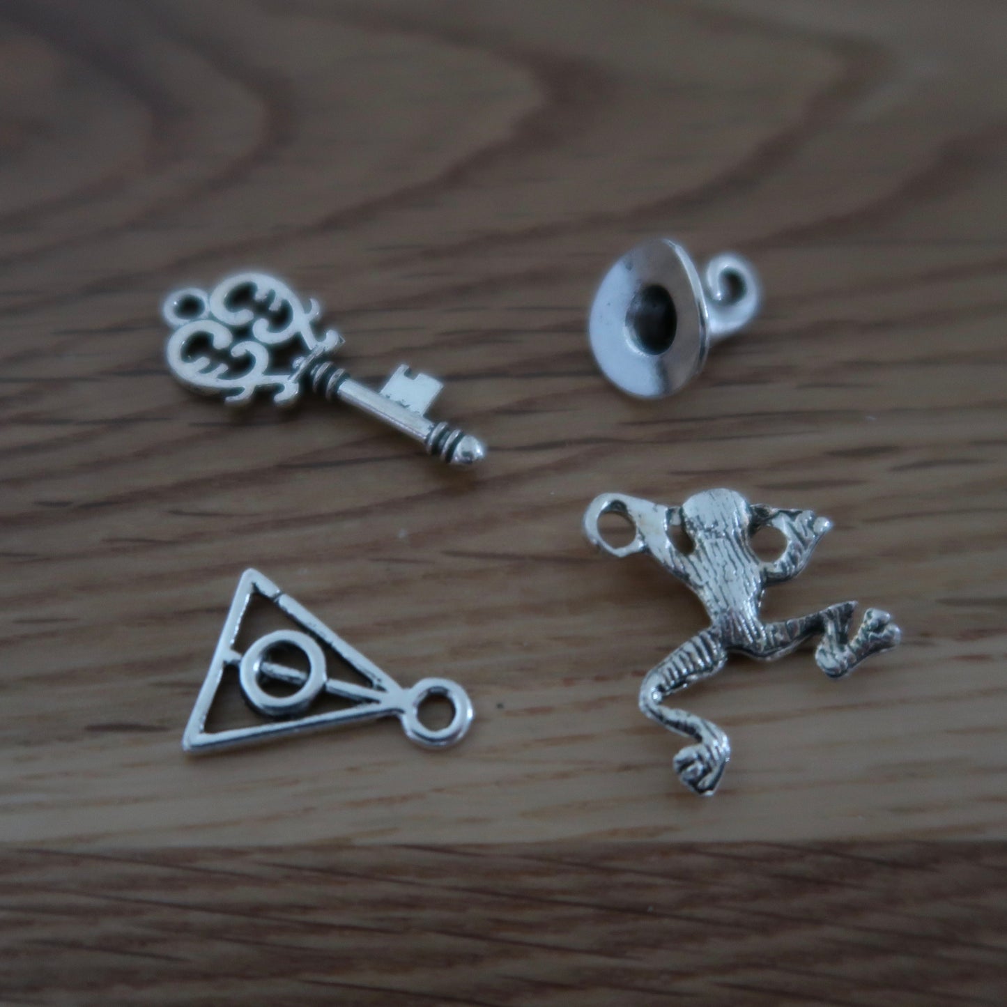 Wizard inspired stitch markers or progress keepers (set of 4) frog / wizard hat / key / symbol