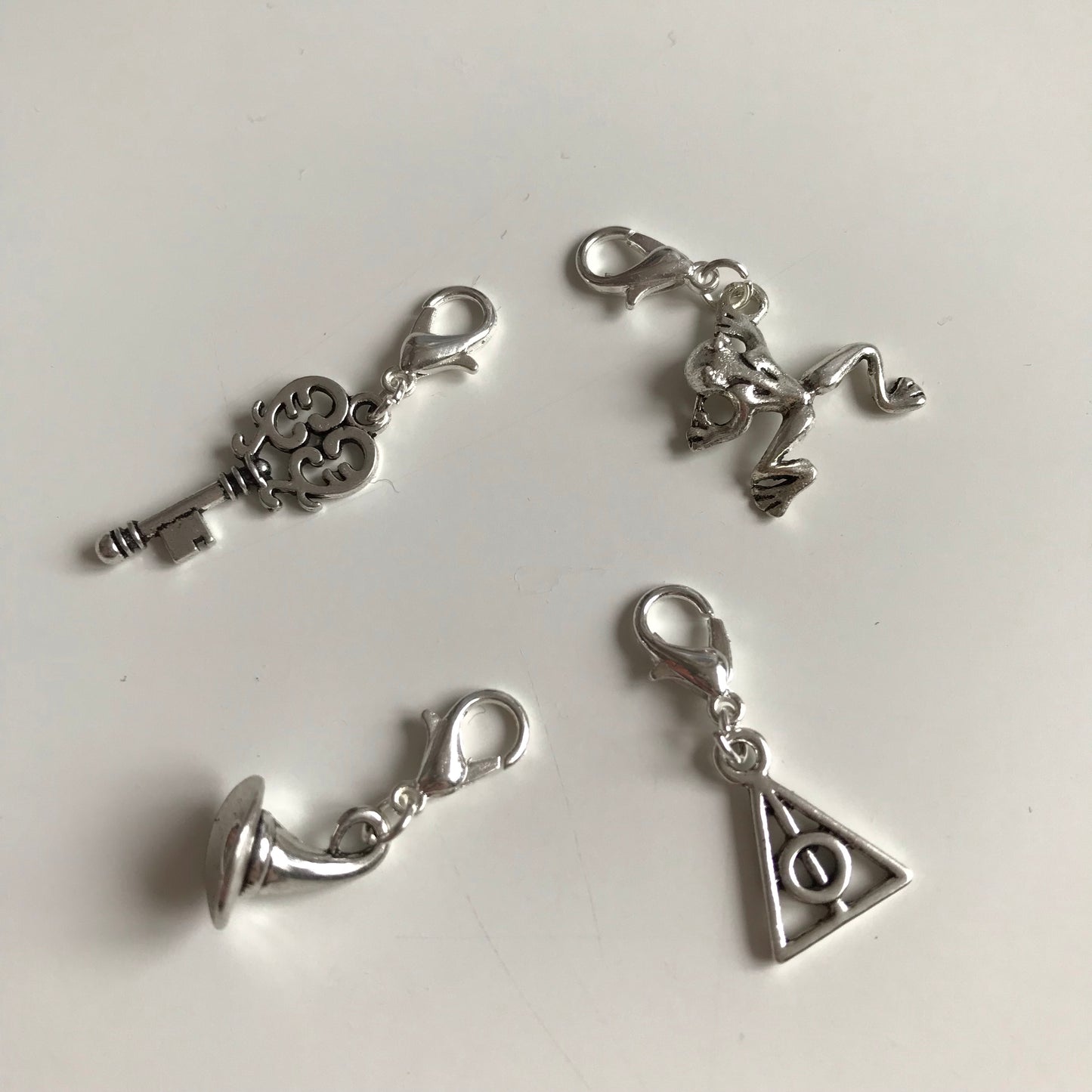 Wizard inspired stitch markers or progress keepers (set of 4) frog / wizard hat / key / symbol