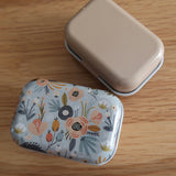 Cute little Tin with bulb pins and tapestry needle