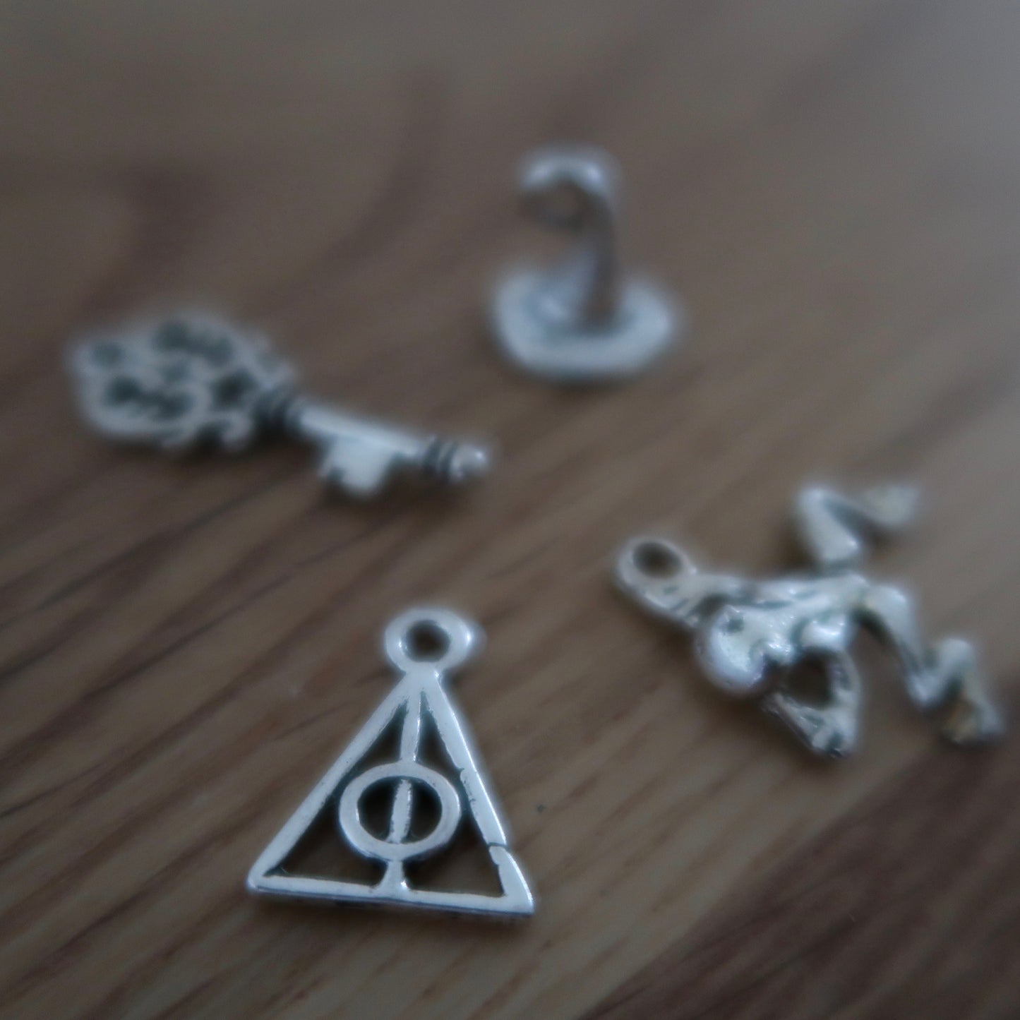 Wizard inspired stitch markers or progress keepers (set of 4) frog / wizard hat / key / symbol