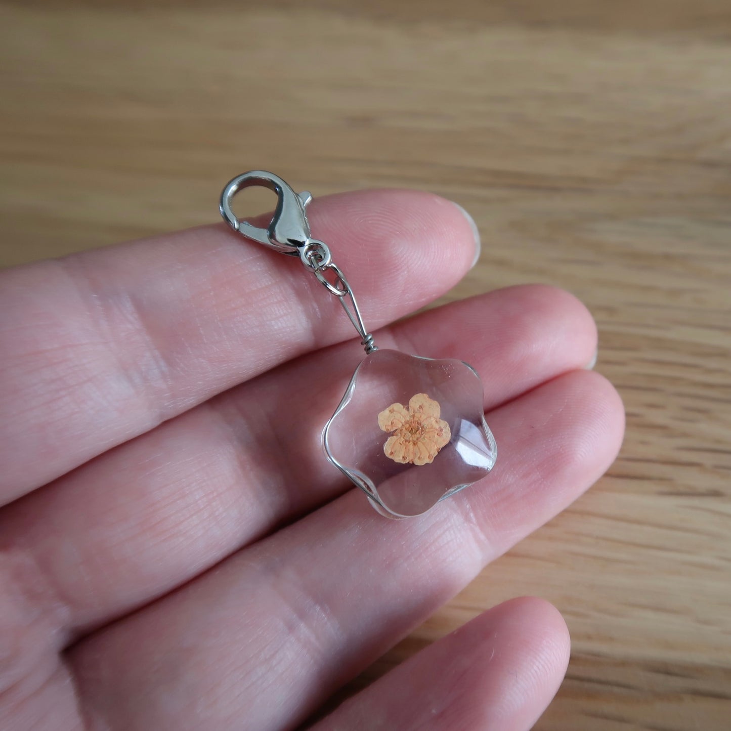 Yellow/orange dried Flower in resin progress keeper
